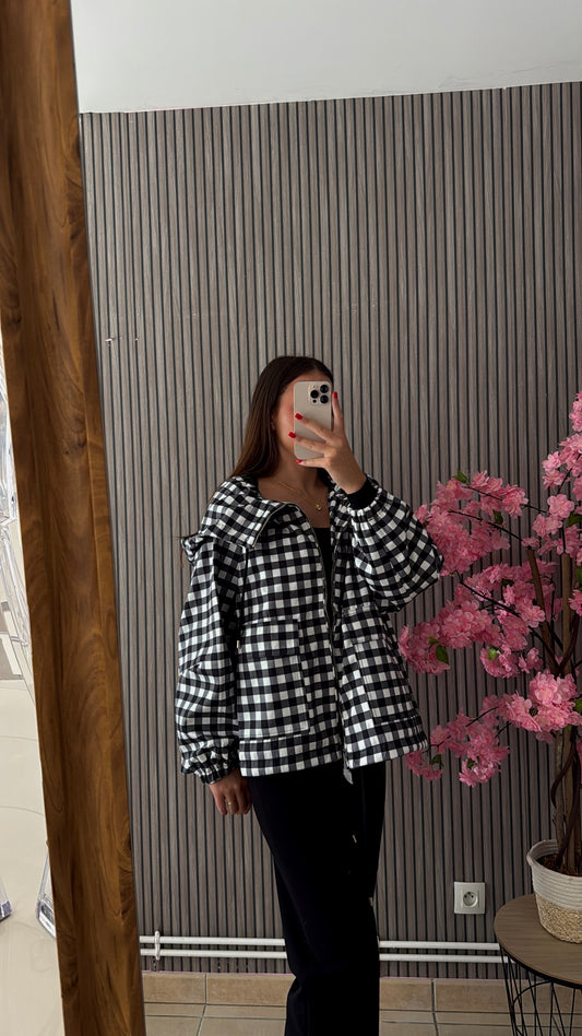 Veste à carreaux noir et blanche